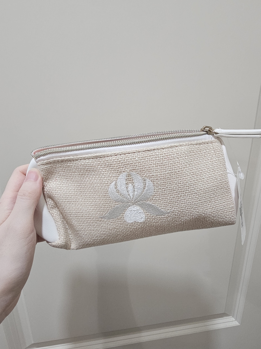 sisley Neutral Woven Cosmetic Pouch with White Floral Accent